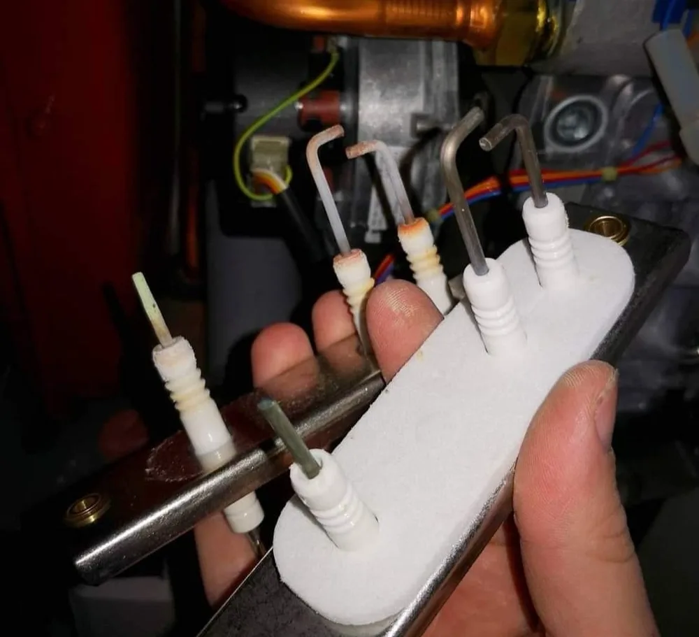 Burner electrode assembly removed during a service