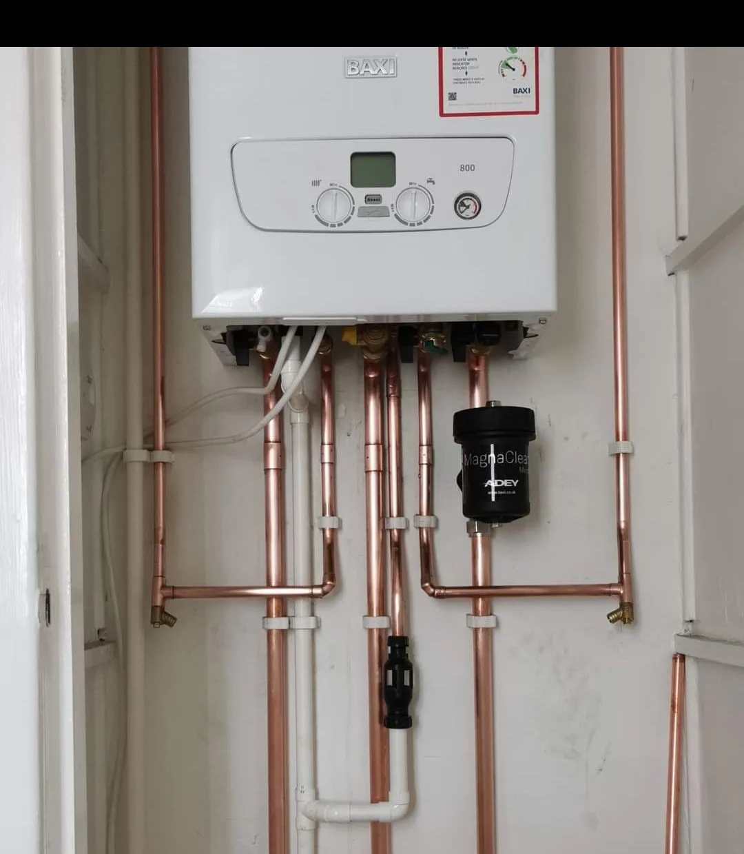 Copper pipework and a newly installed combi boiler